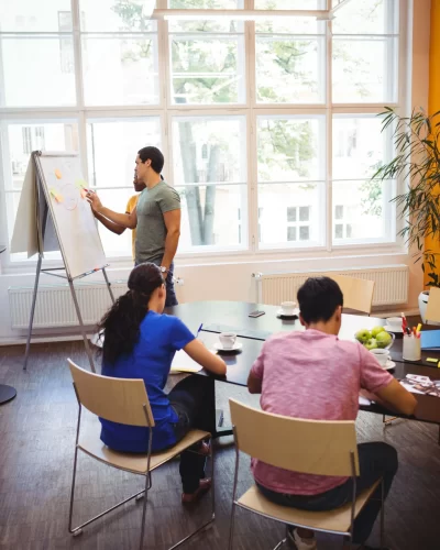business-executives-discussing-with-their-colleagues-whiteboa (1) business-executives-discussing-with-their-colleagues-whiteboa (1)